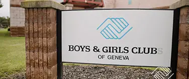 The Boys and Girls Club of Geneva social fundraising campaign page showing the building sign.