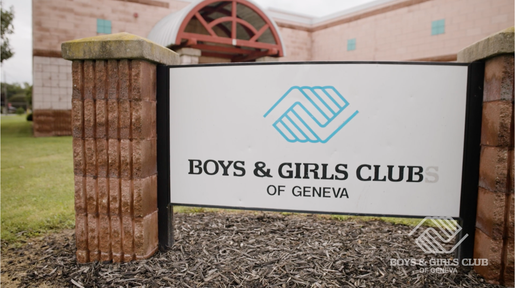 The Boys and Girls Club of Geneva social fundraising campaign page showing the building sign.