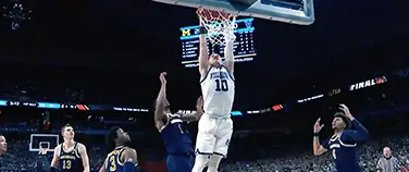 Villanova's social fundraising campaign page showing a slam dunk at a basketball game.