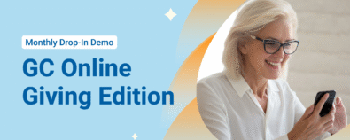 Smiling woman navigating a giving form on her mobile phone.