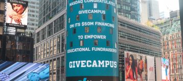 Nasdaq tower in Times Square displaying the message, "Nasdaq congratulates GiveCampus on its $50 million financing to empower educational fundraisers."