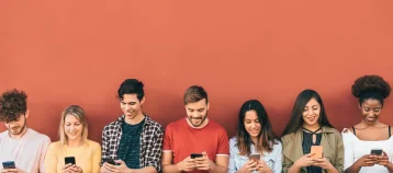 Students looking at smartphones