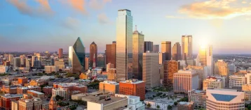 Dallas, Texas cityscape with blue sky at sunset, Texas